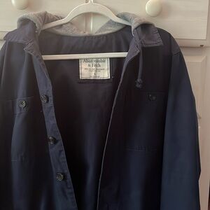 Utility jacket. Navy Blue jacket with gray hood.  Great details.